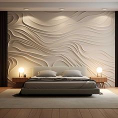 a large bed sitting in a bedroom next to a wall with wavy designs on it