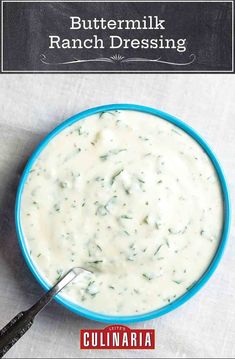 buttermik ranch dressing in a blue bowl with a spoon