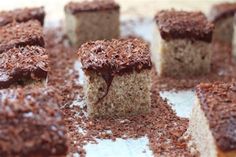 several pieces of chocolate cake sitting on top of each other