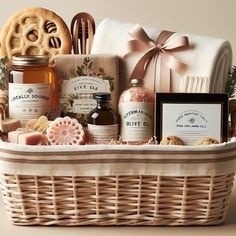 a wicker basket filled with different types of food and items to be used as a gift