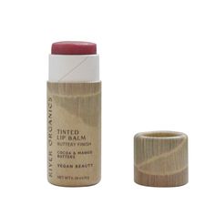 An ultra-hydrating sheer tint lip balm that gives lips a rosy and shiny look. Made of organic toxic-free oils to protect and moisturize lips.    SCENT - No scent is added, the natural scent of this lip balm is light cacao.  HOW TO USE - Open cap and push tube gently up from bottom. Keep at a low level. If you push up too high, simply push back down with lips to make the lip balm retreat. STAR INGREDIENTS - We use Cacao and Mango butters which make the lip balm smoother, thicker and longer lasting.  ✧ 100% Vegan Lip Balm ✧ Cruelty free Certified ✧ Eco-Friendly Paper Tube ✧ Plastic Free Lip Balm Net Weight .28 oz / 8g INGREDIENTS: *Cocos nucifera (coconut) oil, *Macadamia Integrifolia Seed Oil, Euphorbia cerifera (Candelilla wax), *Theobroma cacao seed butter, Mangifera indica (mango) seed b Mango Seed, Highlighter And Bronzer, Color Lip Balm, Macadamia Nut Oil, Vegan Lip Balm, Natural Lip Colors, Cocos Nucifera, Organic Lip Balm, Toxic Free