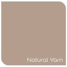 a brown color with the words natural yarn on it