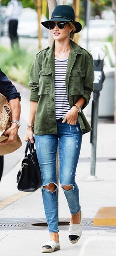 Rosie Huntington-Whiteley wears a striped t-shirt, army jacket, distressed jeans, and Chanel espadrilles Rosie Huntington Whiteley Street Style, Espadrilles Chanel, Chanel Espadrilles, 일본 패션, Mode Tips, Army Green Jacket, Blazer Outfit, Army Jacket, Rosie Huntington Whiteley