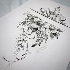 an ink drawing of flowers and leaves on paper