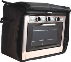 an oven with a black cover over it