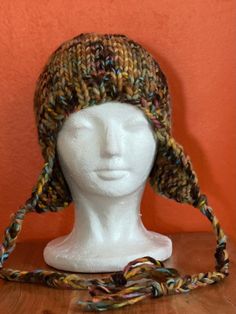 Multicolored winter hat with ear flaps. One size fits most adults Hat With Ear Flaps, Ear Hats, Skull Cap Beanie, Winter Hat, Skull Cap, Caps Hats, Accessories Hats, Winter Hats, Ships