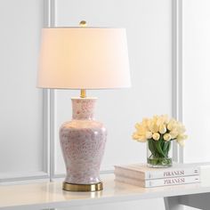 Infuse gracious style into any living room with this traditional table lamp. Delicate pink flowers cascade over its classic white ceramic curves, while its base and finial feature a luxurious brass gold finish. Sold in sets of two. Features gold harp, 60" cord and cotton shade. Measures: 16" X 16" X 28". Click images for greater detail. Nightstand Table, Desk Nightstand, Traditional Table Lamps, Gold Table Lamp, Transitional Wall Sconces, Traditional Table, Lamp Set, Cool Floor Lamps, Gold Table