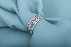 This Handcrafted Viking Style Band features a unique pattern inspired by Norse ornament jewelry. With its distinctive design, this ring is perfect for those who want to make a bold statement. It is handmade with care and crafted from high-quality materials. The Scandinavian and Nordic influences add a touch of Viking charm to this piece. Embrace your inner warrior and showcase your love for ancient traditions with this stunning ring. ★ SIZE and WEIGHT ★ This ring can be made almost in any size y Scandinavian Folk Art Swedish Style, Urnes Style, Norse Ring, Viking Ornament, Viking Pattern, Norse Jewelry, Scandinavian Jewelry, Celtic Culture, Ancient Vikings