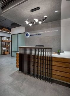 the interior of an office with wood and metal accents