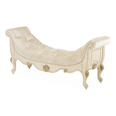 an antique white chaise lounger on display