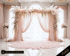 an elegant wedding ceremony setup with pink flowers and white feathers on the draping