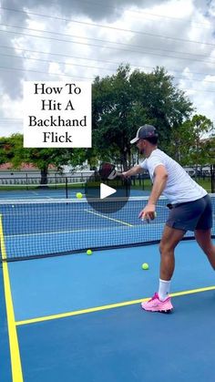 a woman hitting a tennis ball with a racquet on a blue tennis court