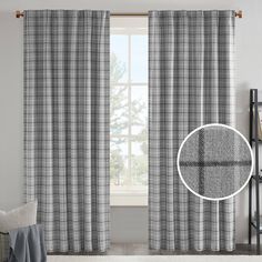 the curtains are open and ready to be hung in front of a window with a plaid pattern