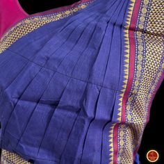 Design by Classical Dance Jewelry® ❥ A collection of colorful and elegant dance sarees in cotton fabric with minimalistic patterns for all the ladies who are ardent fans of our traditional dance. ❥ These sarees are also known as Kalakshethra sarees. ❥ Dance practice sarees have different measurements than the usual sarees and can't be used as a party wear or casual wear. ❥ It is made of pure cotton saree with plain contrast color borders.These practice sarees worn over pajamas / pants and a chol Blue Art Silk Pre-draped Saree With Traditional Patterns, Traditional Blue Pre-draped Saree For Festivals, Festive Blue Handloom Pre-draped Saree, Festive Cotton Pre-draped Saree With Zari Weaving, Cotton Pre-draped Saree For Puja During Navratri, Blue Cotton Silk Pre-draped Saree With Zari Weaving, Traditional Blue Pre-draped Saree For Navratri, Traditional Purple Cotton Silk Pre-draped Saree, Traditional Blue Handloom Pre-draped Saree