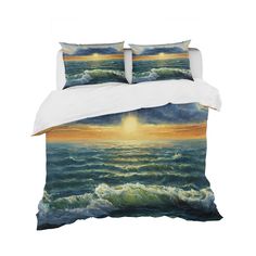 an ocean scene with waves and sun in the sky on a white bedding set