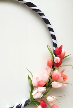 a black and white rope with flowers on it