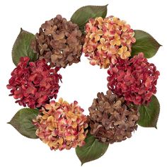 a wreath made out of flowers and leaves