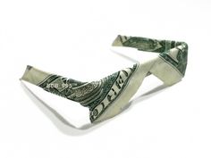 a tie made out of one hundred dollar bills on a white background with the words for 50 dollars written across it