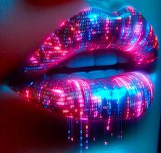 a woman's lips covered in colorful lights