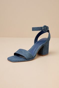 Nothing's easier than matching your favorite 'fits with the D'Amelio Footwear Imery Blue Jean Denim Ankle Strap High Heel Sandals! Woven denim fabric shapes these essential heels with a square footbed, a slender vamp strap, and a single sole silhouette. Wide straps sprout from the sides and wrap around the ankle to secure with a covered, circular buckle, all atop a chunky block heel. 3. 25" block heel. Cushioned insole. Rubber sole has nonskid markings. Man Made Materials. Imported. Lulus | Imer Square Toe Shoes, Ankle Strap High Heels, Lulu Fashion, Size 11 Heels, Sandal Heels, Blue Heels, Chunky Block Heels, Dress Shoes Womens, Heel Sandal