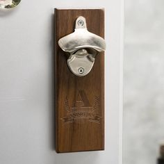 a door handle with a wooden plaque on it