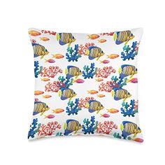 a white pillow with colorful fish and corals on it