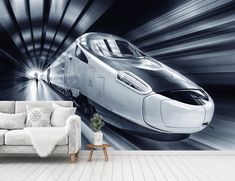 a modern train traveling through a tunnel in black and white wallpaper mural print on a living room wall