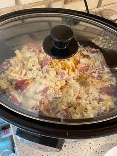 the food is being cooked in the slow cooker