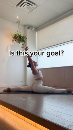 a woman is doing yoga with the words is this your goal?