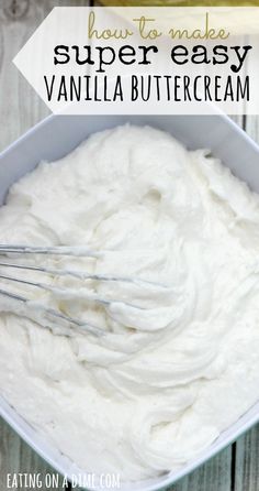 a white bowl filled with whipped cream next to bananas