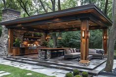 an outdoor kitchen and living area in a backyard