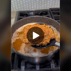 a frying pan filled with food on top of a stove