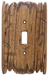 a wooden light switch cover with holes in it