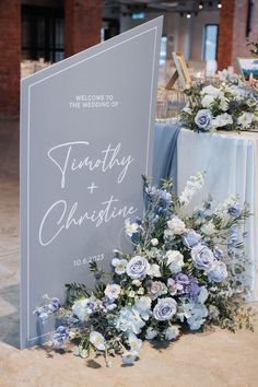 Wedding Motif Dusty Blue, Dusty Blue Seating Chart Wedding, Wedding Backdrop Design Blue, Blue Wedding Arch Ideas, White And Blue Floral Centerpieces, Dusty Blue Quinceanera Decorations, Wedding Reception Ideas Blue, Dusty Blue Themed Wedding, Wedding Welcome Sign Blue