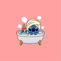 stitcher in the bathtub with a towel on his head and a stuffed animal