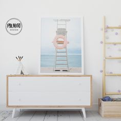 "Printable wall art of a Lifeguard chair in light tones with pink and the beach landscape to give a beachy air to your home! Wall art is an affordable and easy way to refresh and upgrade the room decor of your space. Wall art trends, be it for your living room, foyer, bedroom, office, dining room, nursery or kitchen. You will find your perfect match here and choose the best piece to grace your space! AN AMAZING GIFT for housewarmings, birthdays, Christmas, holidays, anniversaries and any occasion. Makes a perfect housewarming gift for a newly occupied dorm room or a new apartment. ♡ PLEASE NOTE This frame is for INSTANT DOWNLOAD Your files will be available to download once payment is confirmed. After checkout, the files will be available to download by visiting the purchases and reviews s Pink Printable Wall Art, Pineapple Art Print, Lifeguard Chair, Pink Printable, Palm Tree Art, Pink Living Room, Wall Art Pink, Pastel Room, Space Wall Art