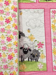 two quilts with sheep and flowers on them