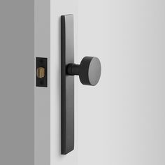 an open door with a black handle on it