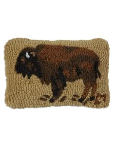 a pillow with an image of a bison on it