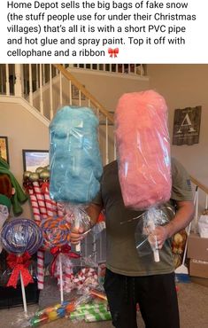 a man is holding two bags of candy in front of him and the caption reads, home depot sells the big bags of fake snow