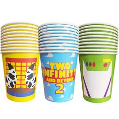 there are three cups with different designs on them