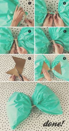 how to make a paper bow with scissors and tape on the side, step by step instructions