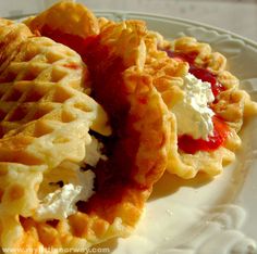 some waffles are on a white plate