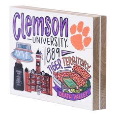 the clemson university tiger stadium sign has been painted on to it's wood block