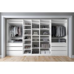 a walk in closet filled with lots of white drawers and clothes on top of shelves