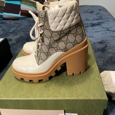 These Gucci Lace-Up Ankle Boots Are Super Fun. They Are Creme With Classic Gucci Pattern Accents. They Are Easy To Walk In And Go With Jeans, A Sweater Dress, Or Cute Skirt. I’ve Worn These A Few Times And They Have Some Very Minor Scuffs That Can Be Buffed Out. Take A Look At The Pics. They Are Cream And Classic Gucci Color Patterned. Designer Beige Boots With Leather Sole, Designer Leather Boots With Block Heel, Beige Calf Leather Heeled Boots With Round Toe, Designer Calf Leather Heeled Boots, Luxury White Heeled Boots, Gucci Round Toe Calf Leather Heels, Gucci Calf Leather Heels With Round Toe, Gucci Calf Leather Round Toe Heels, Gucci Brown Ankle Boots