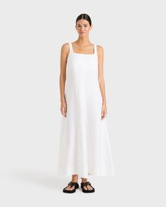 The Delphi flared Maxi Dress in white is cut from a luxury 100% organic linen that has been milled by a Masters or Linen. This classic, minimal dress has a contemporary square neckline. The mid-weight structured linen provides volume that flares to the ankles. Never going out of style, this dress is perfect for elevated day dressing and events. Luxury fabric sustainably made in Europe. Swimsuit Aesthetic, Minimal Dress, Luxury Fabric, Organic Linens, Dress Cover, Australian Fashion, White Maxi Dresses, White Summer, Linen Dresses