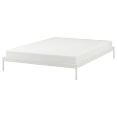 a white bed frame with no sheets on it and the mattress is not in position