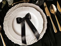 black and white place setting with silverware