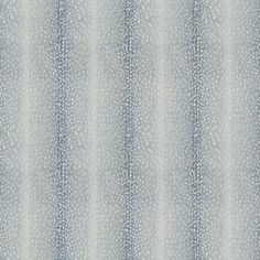 a blue and white striped wallpaper with small dots on the bottom half of it